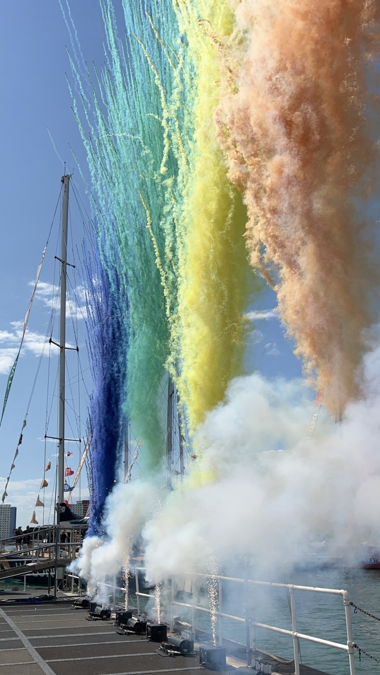 Coloured smoke mines create clouds of vibrant colours in the sky